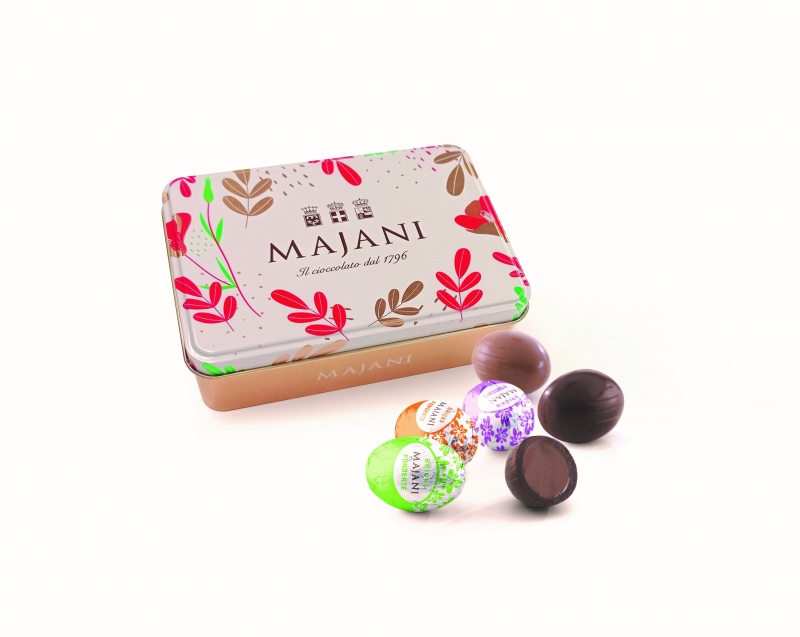 Конфеты шоколадные ассорти из молочного и горького шоколада в форме яйца в жестяной коробке