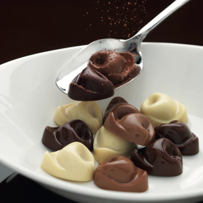 Конфеты шоколадные TORTELLINO из горького шоколада с начинкой из крема какао 24 г